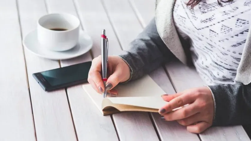 desk-notebook-writing-work-hand.webp